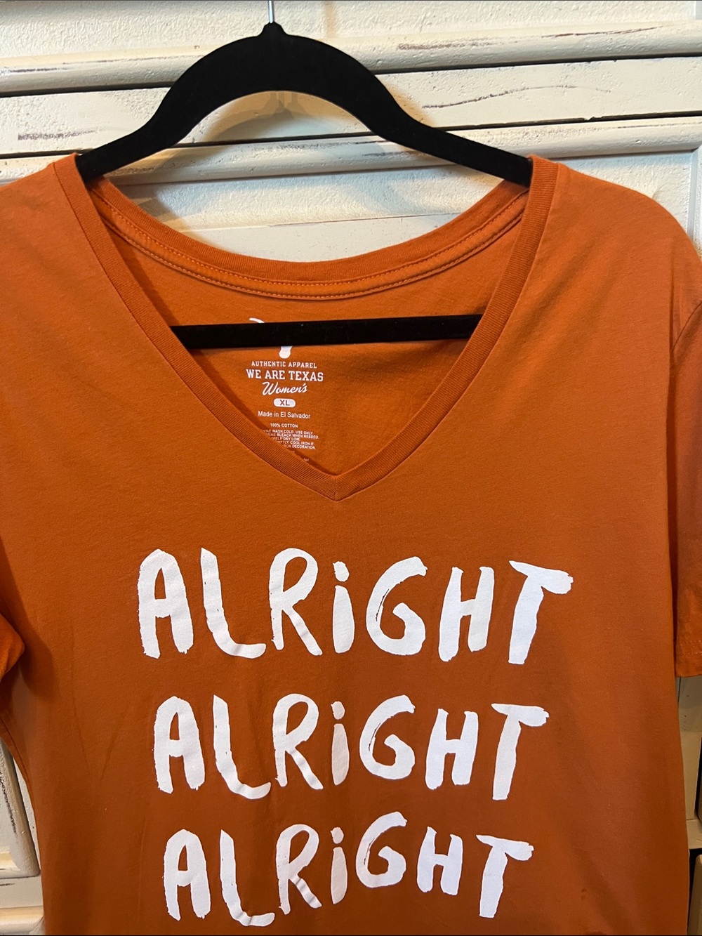 Women's Orange 'Alright Alright Alright' V-Neck Graphic Tee